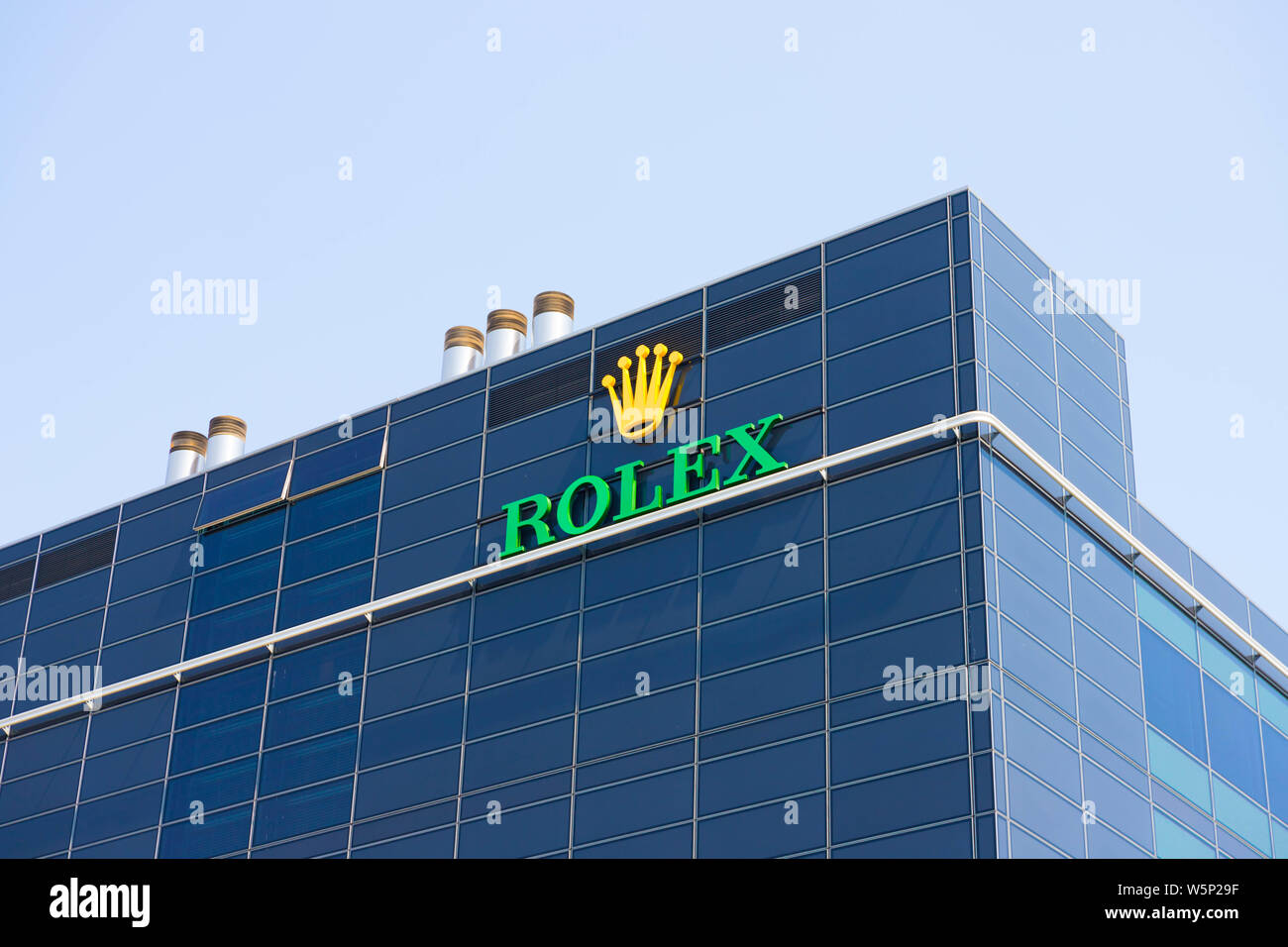 Logo Rolex Watch Headquarters building in Switzerland Geneva Stock