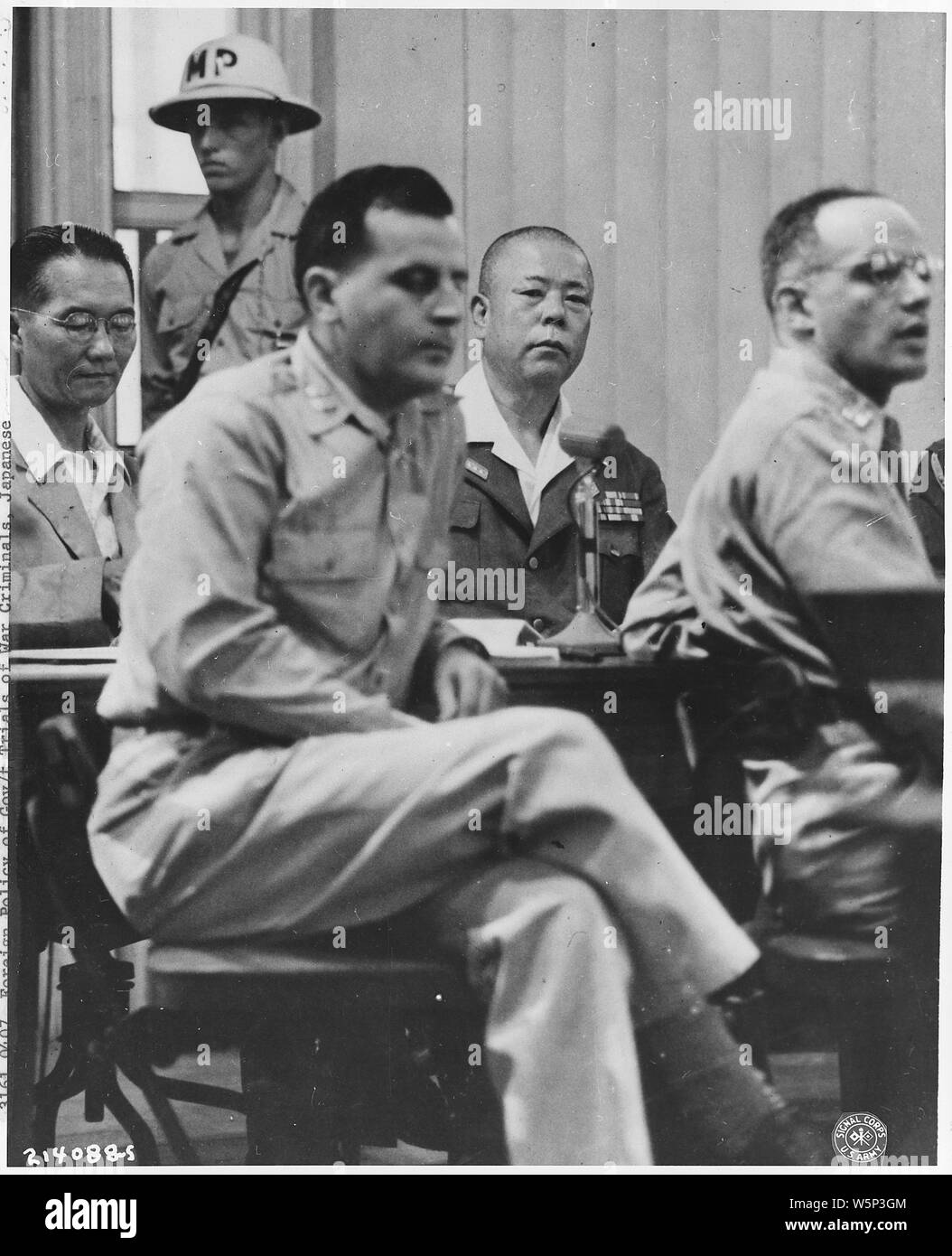 Japanese War Crimes Trials. Manila; Scope and content:  YAMASHITA TRIAL - Japanese General Tomoyuki Yamashita, flanked by his counsel, at his trial at Manila, P.I. 10/29/45. Stock Photo