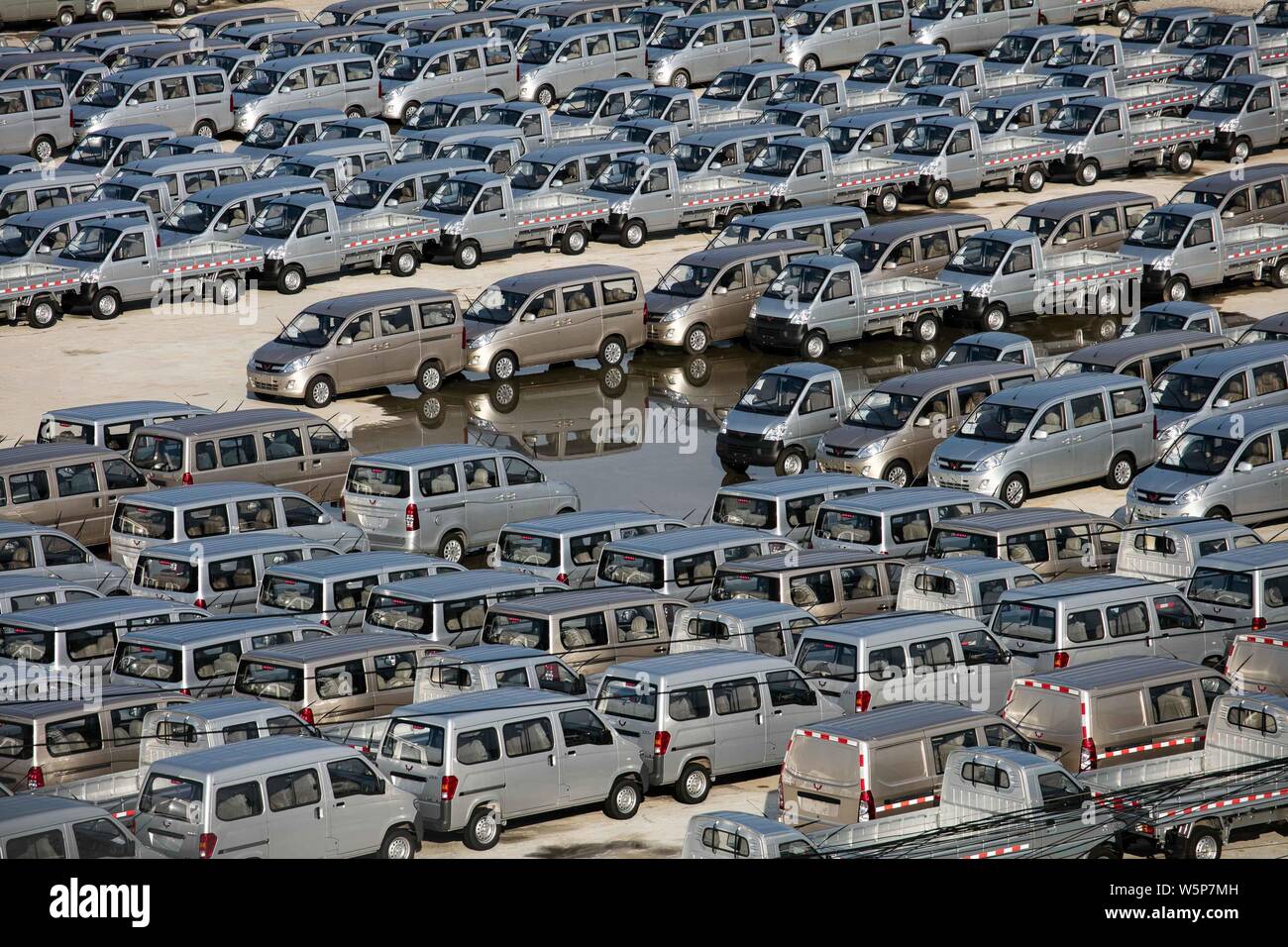 FILEIn this aerial view, newlymanufactured cars are lined up at a