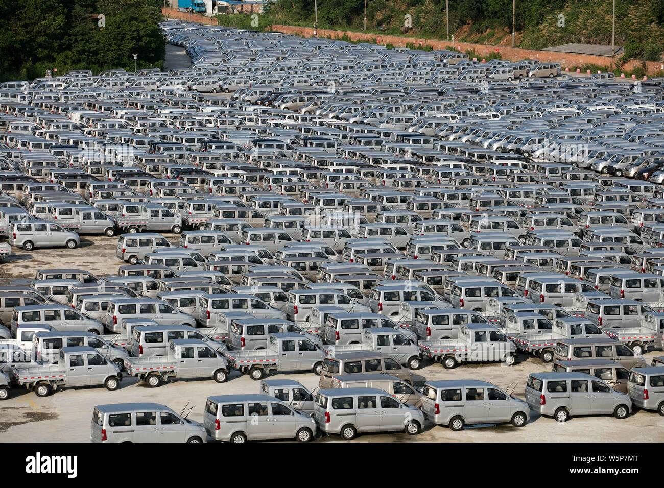 FILEIn this aerial view, newlymanufactured cars are lined up at a