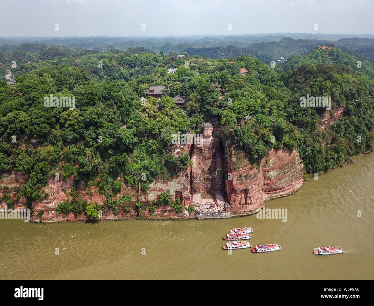 Aerial view of the Leshan Giant Buddha after renovating its damaged chest and abdomen and remove algae on its face in Leshan city, southwest China's S Stock Photo