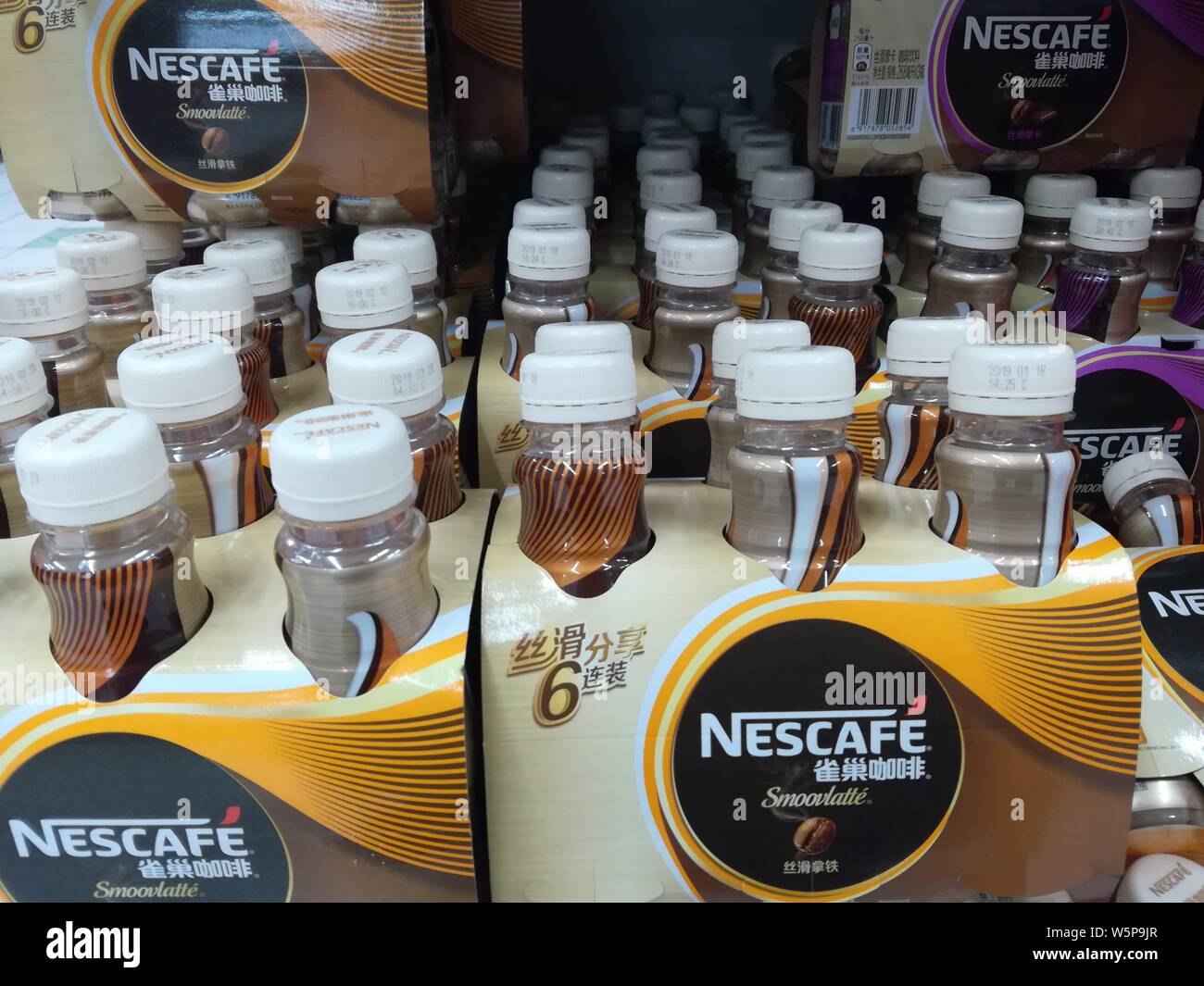 --FILE--Bottles of Nescafe instant coffee of Nestle are for sale at a supermarket in Yichang city, central China's Hubei province, 6 May 2019.   Nestl Stock Photo