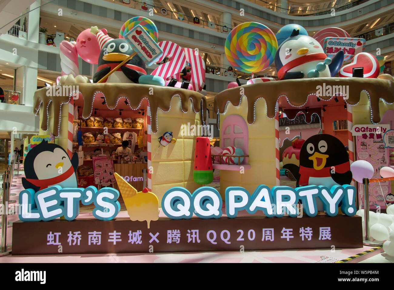 Customers enjoy themselves during an exhibition showcasing all the ...