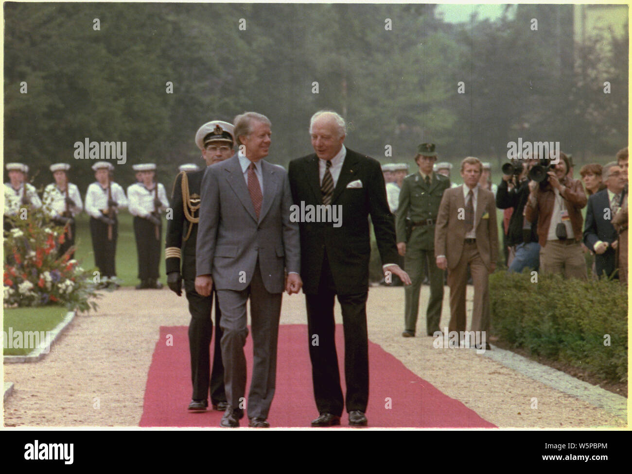 Jimmy Carter is welcomed to Germany by German President Walter Scheel during arrival ceremony. Stock Photo