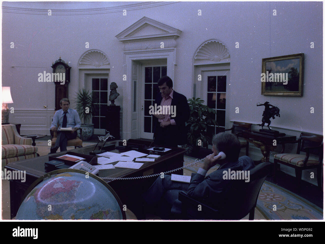 Jody Powell and Hamilton Jordan meet with Jimmy Carter in the Oval