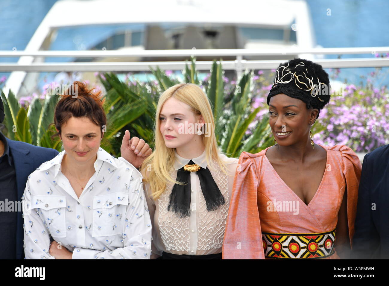 (From left) Cury members Italian film director Alice Rohrwacher, American actress Elle Fanning, and Senegalese actress and comedian Maimouna N'Diaye p Stock Photo