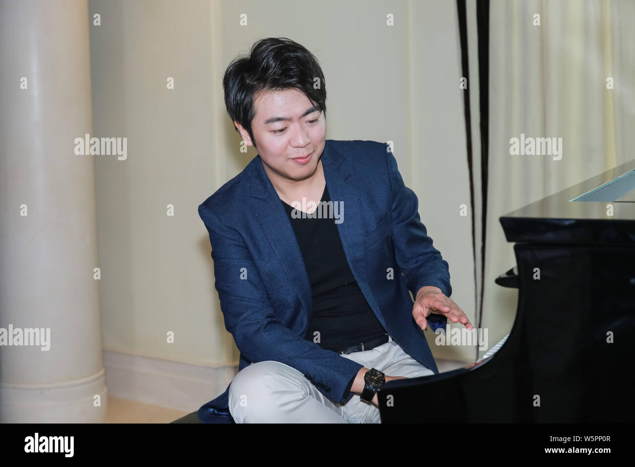 Chinese pianist Lang Lang performs during a promotional event in ...