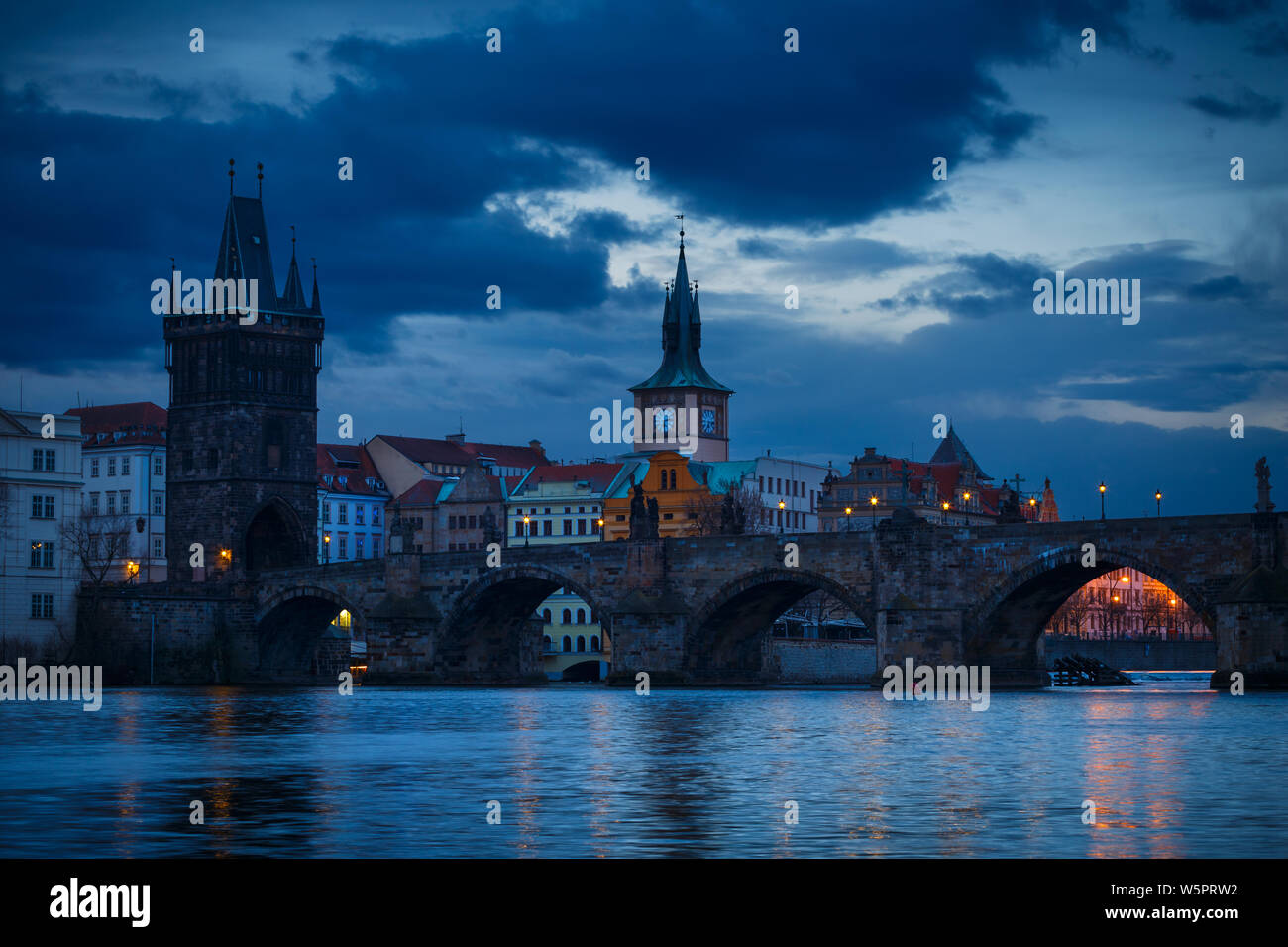 Morning view of Charles Bridge and Old Town Bridge Tower over river Vltava. Stock Photo