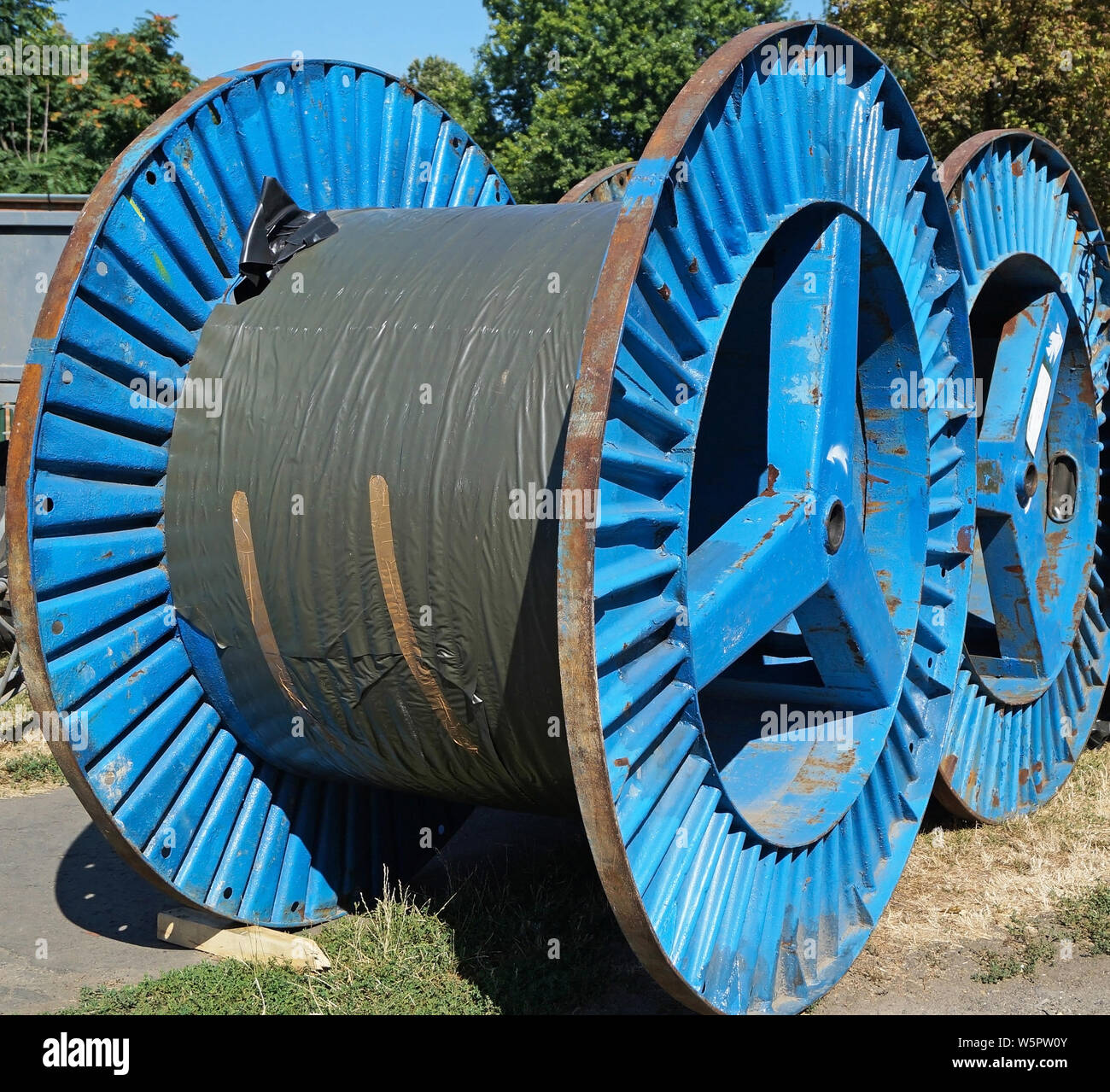 Large cable reels on the street Stock Photo Alamy