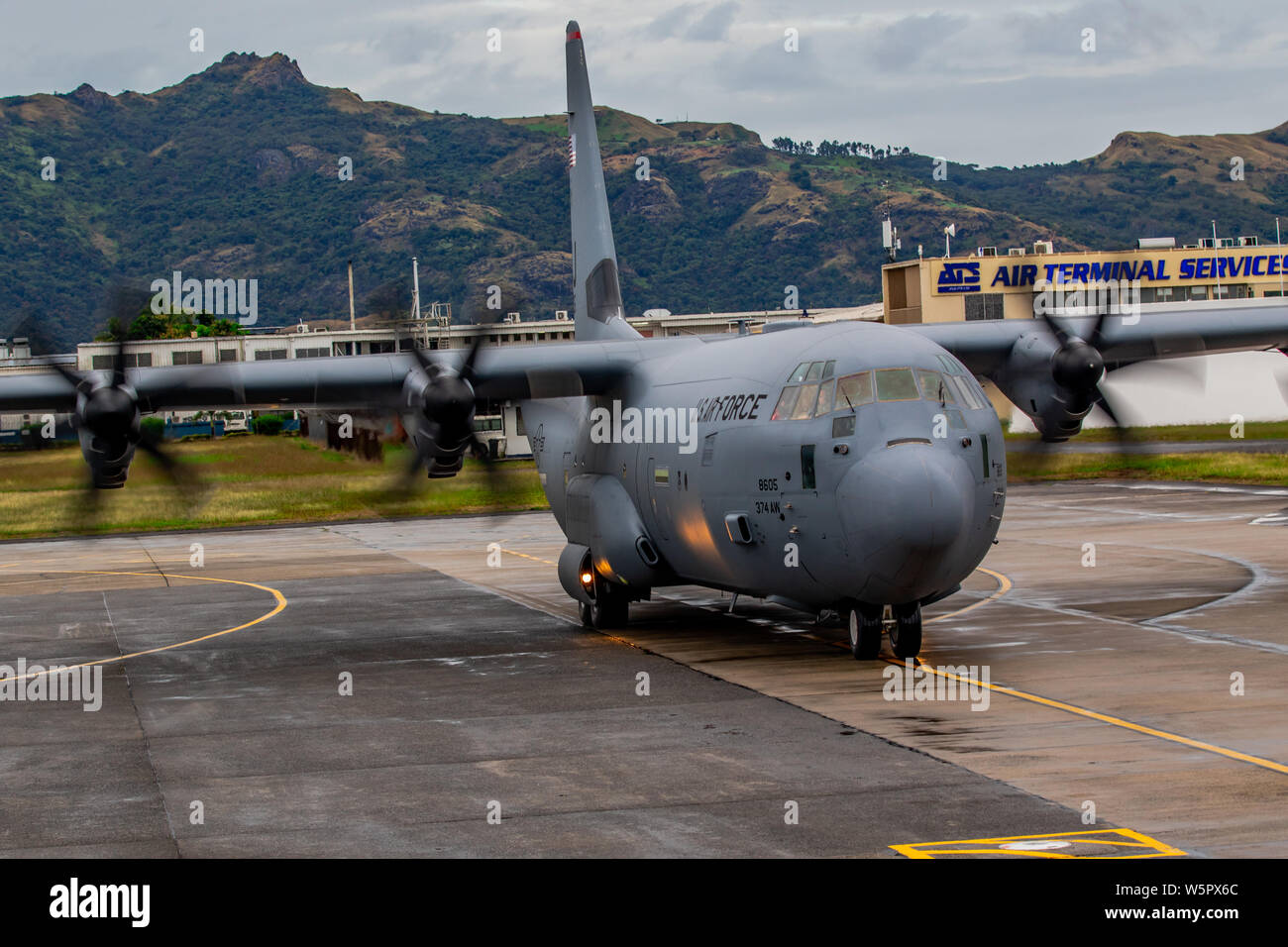 A C-130 Hercules taxis down a runway at the Nadi International Airport, July 27. The aircraft was one of two that brought U.S. Army Soldiers serving with the 1st Battalion, 27th Infantry Regiment, 2nd Brigade, 25th Infantry Brigade Combat Team, 25th Infantry Division, to stage for Exercise Cartwheel 2019 that will start on the 29th. Exercise Cartwheel is a bilateral military-to-military training exercise, and is an opportunity to enhance professional relationships, military operations, and readiness between the U.S. Army and Fijian forces while strengthening security relations for a free and o Stock Photo