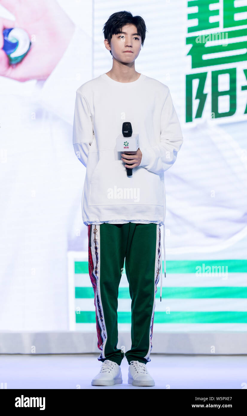 Karry Wang Jun Kai of Chinese boy group TFBoys attends a promotional ...
