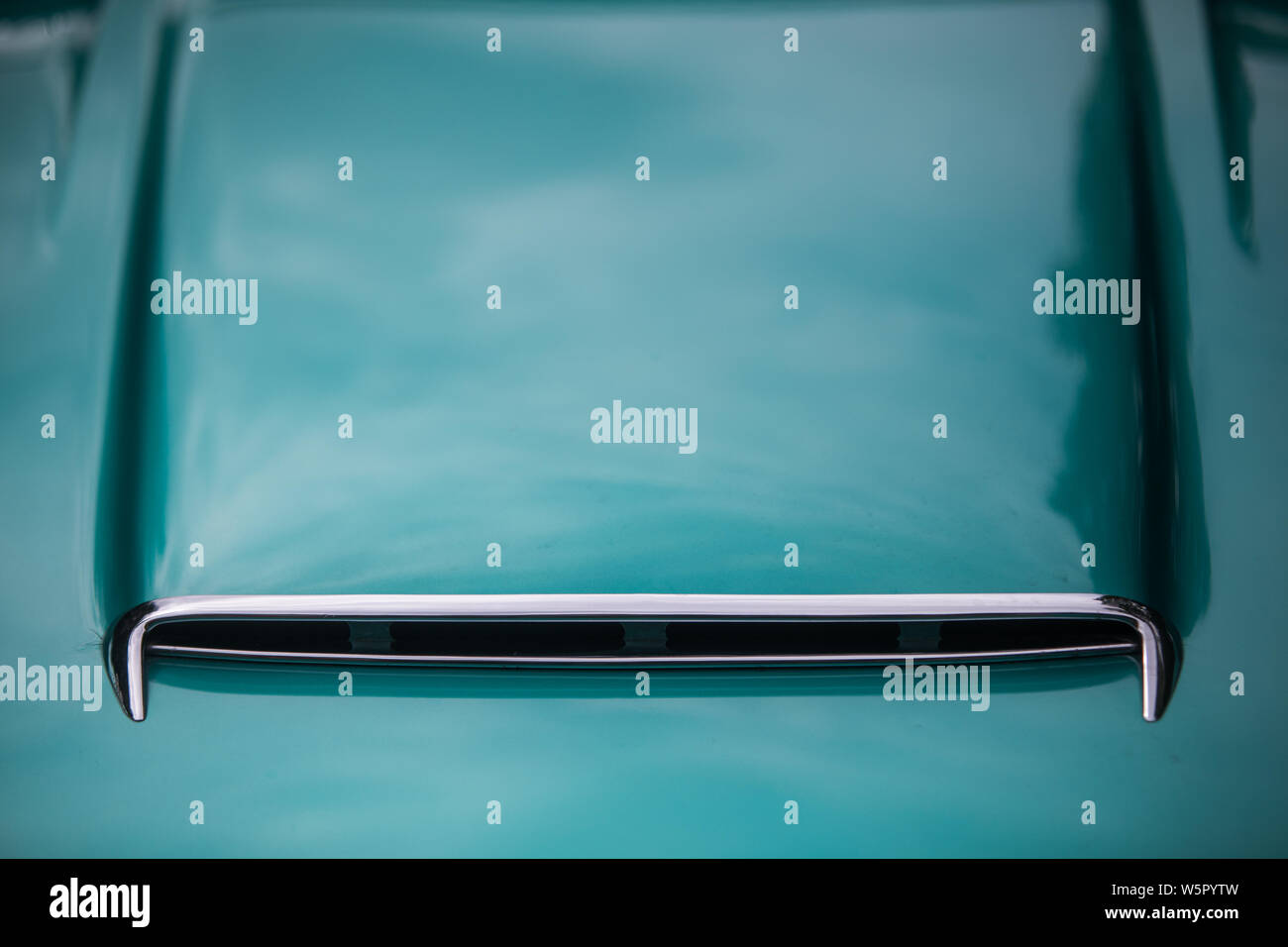 Color close up of the air intake on a vintage classic car hood Stock