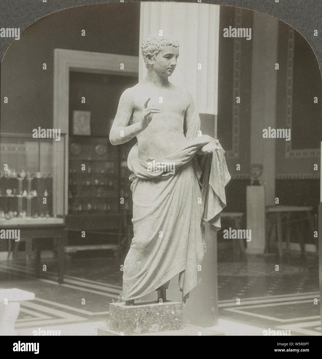 A Roman Boy, bronze statue, Metropolitan Museum, New York, N.Y. 1920s. Stock Photo