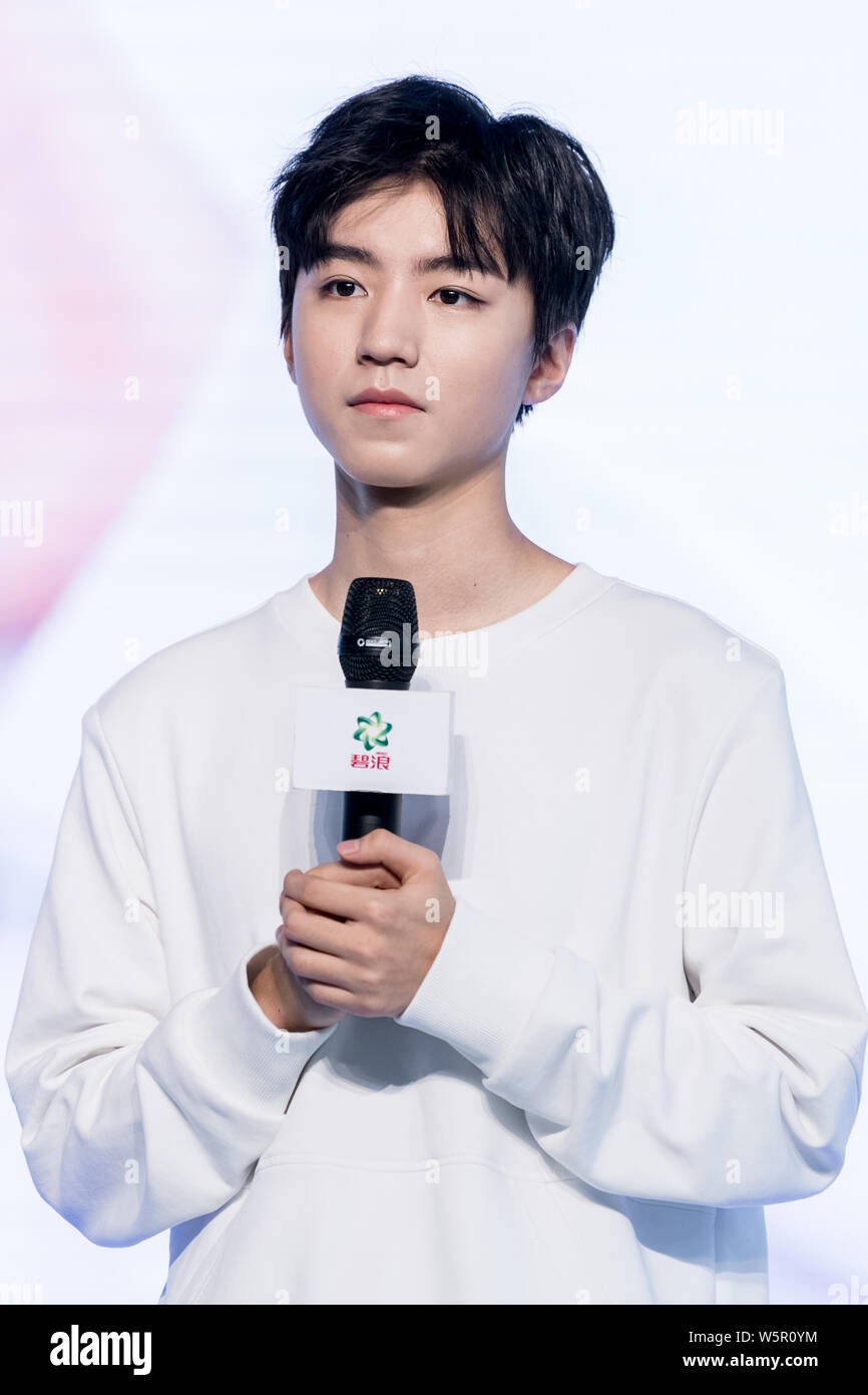Karry Wang Jun Kai of Chinese boy group TFBoys attends a promotional ...