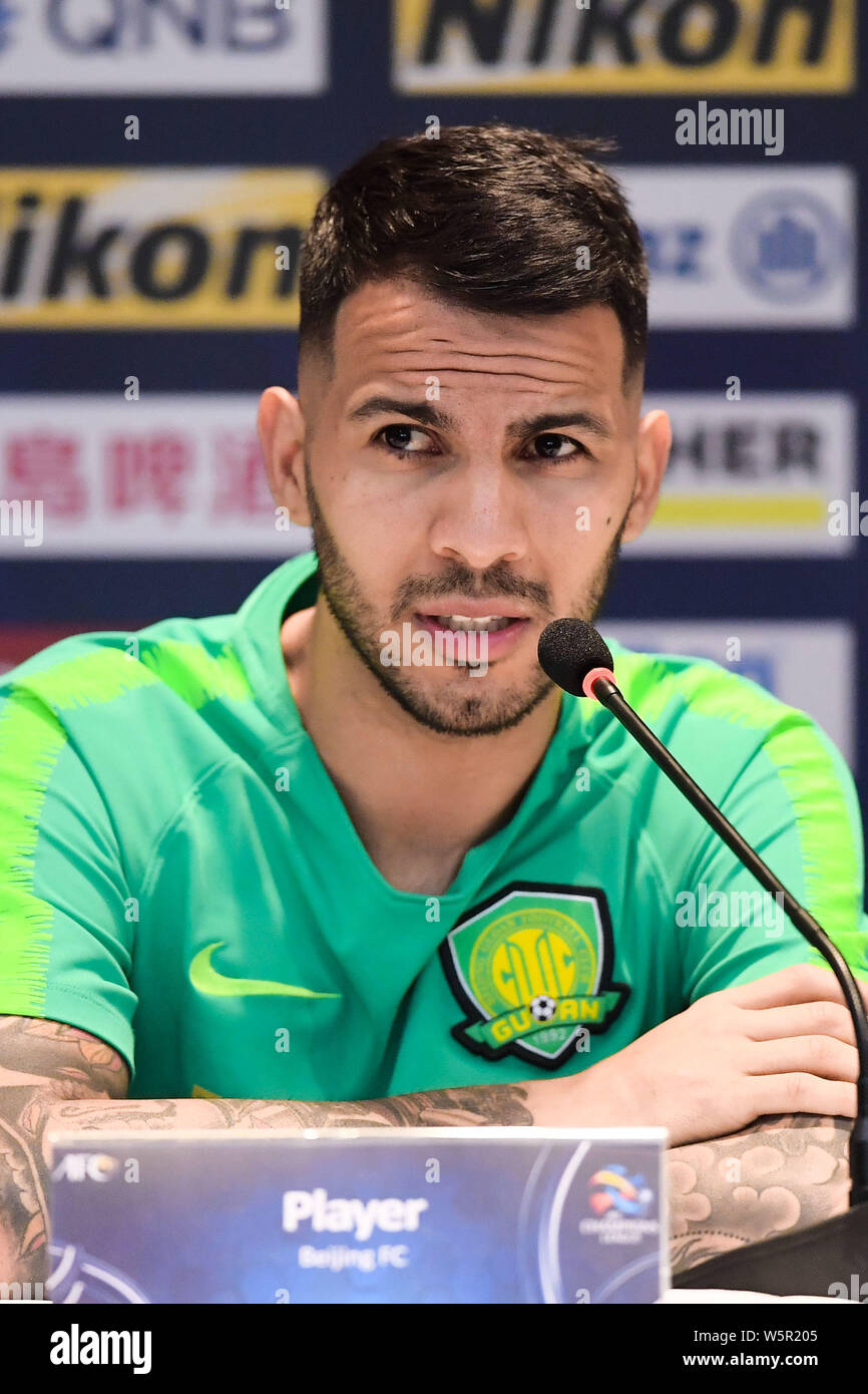Spanish football player Jonathan Viera of China's Beijing Sinbo Guoan F.C.  attends a press conference before the 5th round of group G match against So  Stock Photo - Alamy