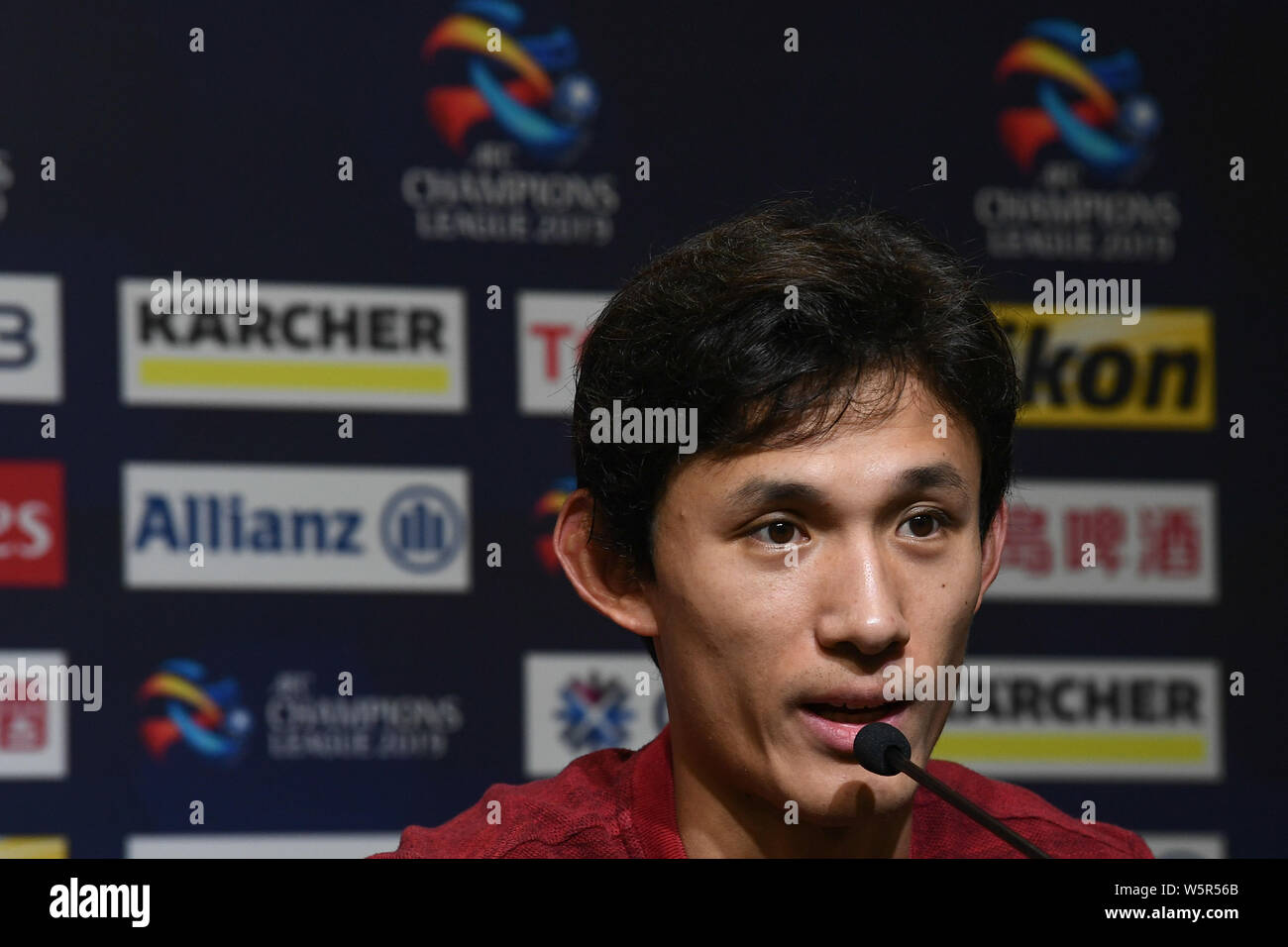 Wang Shenchao of China's Shanghai SIPG F.C. attends a press conference