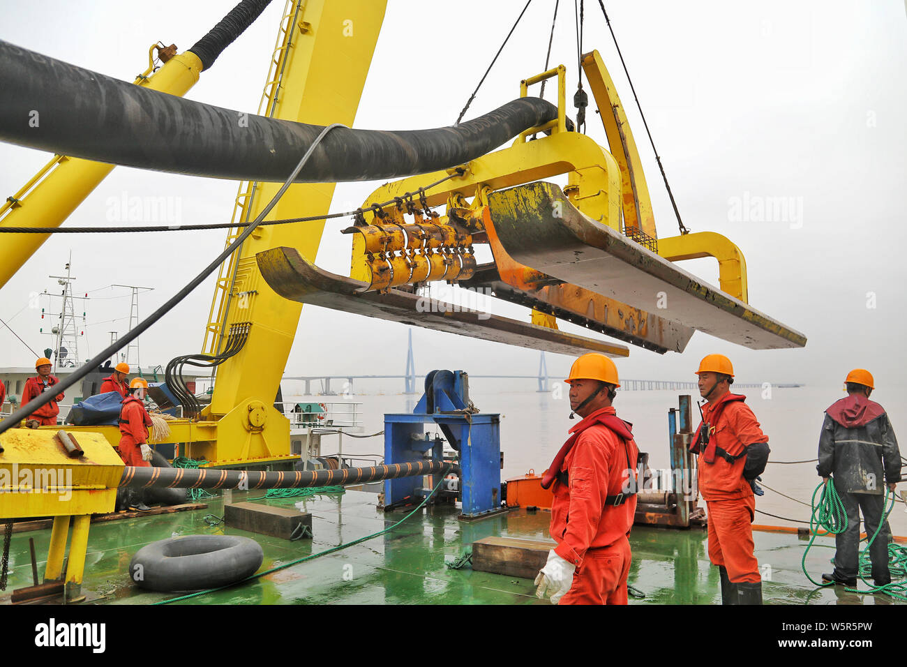 Chinese workders labor at the construction site of the 500kilovolt (kv