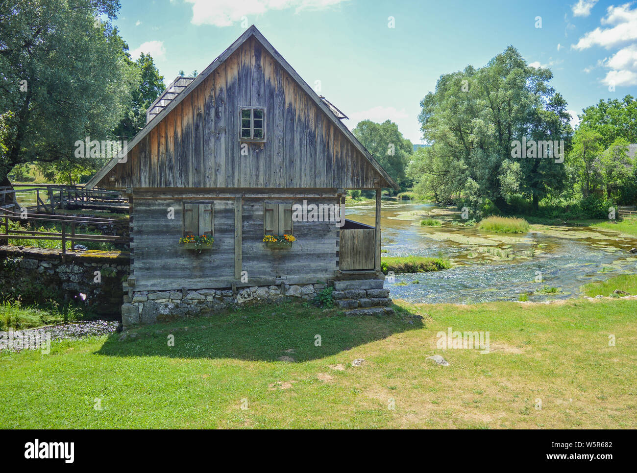 Wooden water mill on river Gacka springs, Majerovo vrilo Stock Photo