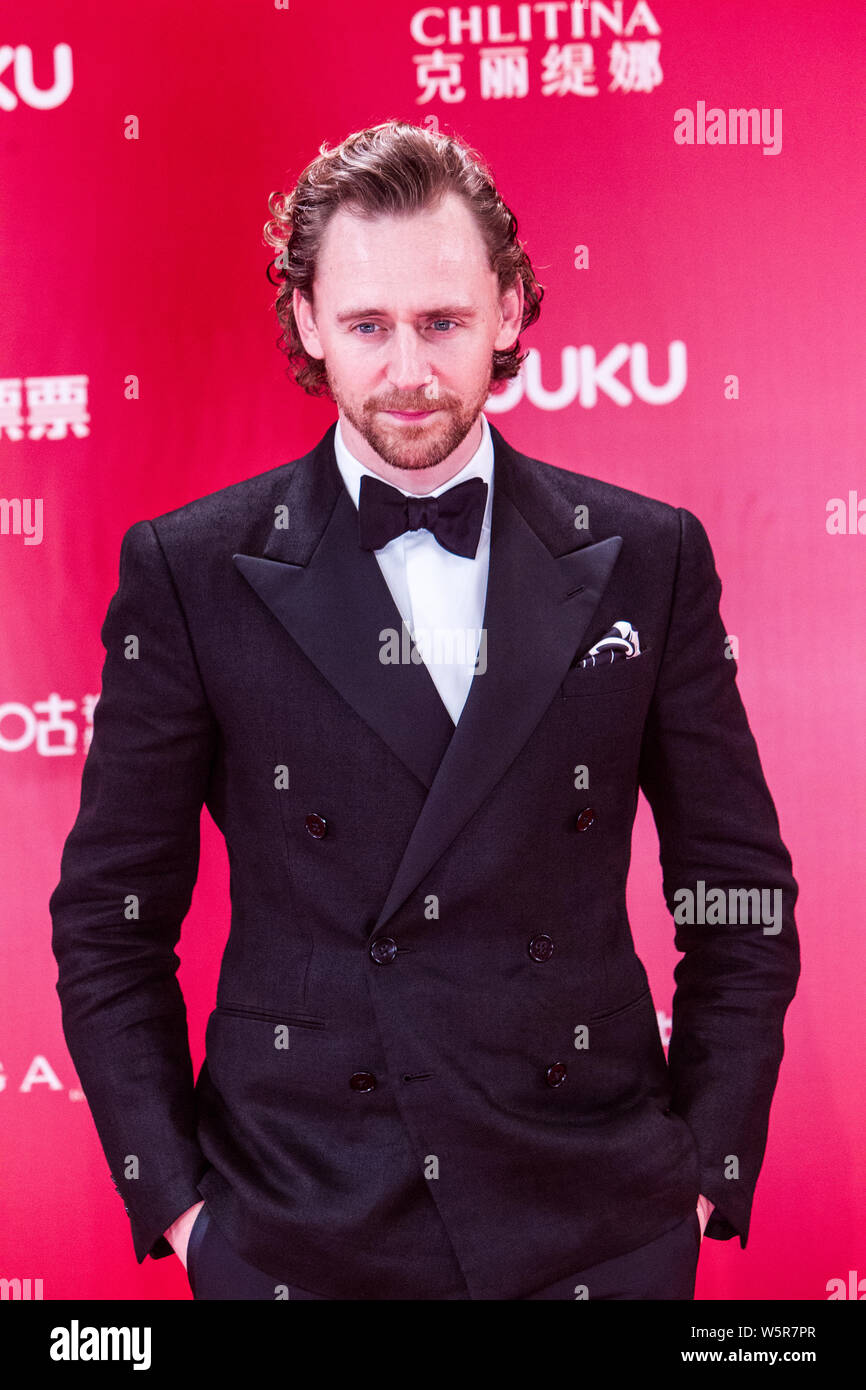 English actor and film producer Tom Hiddleston, center, arrives on the ...