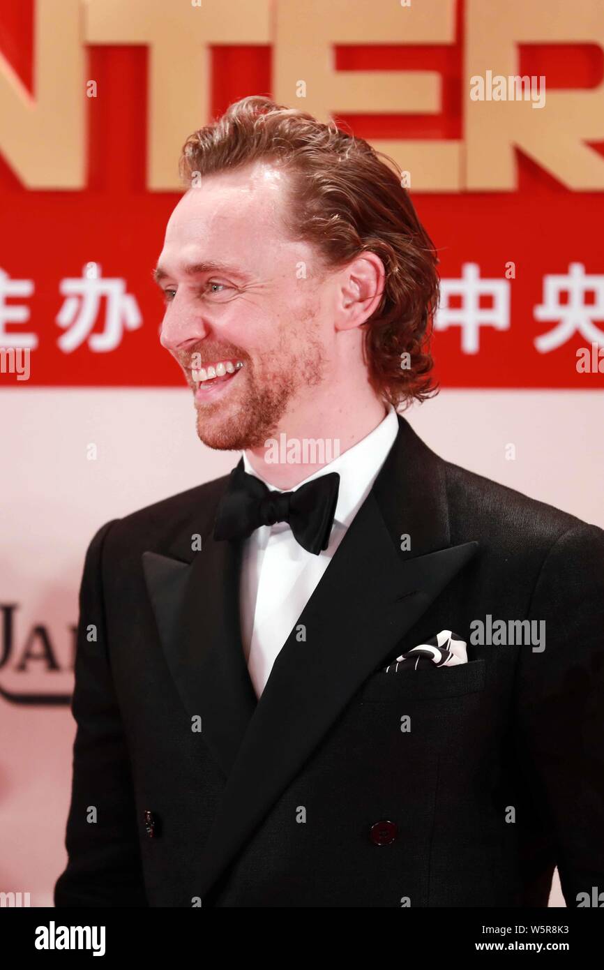English actor and film producer Tom Hiddleston, center, arrives on the ...