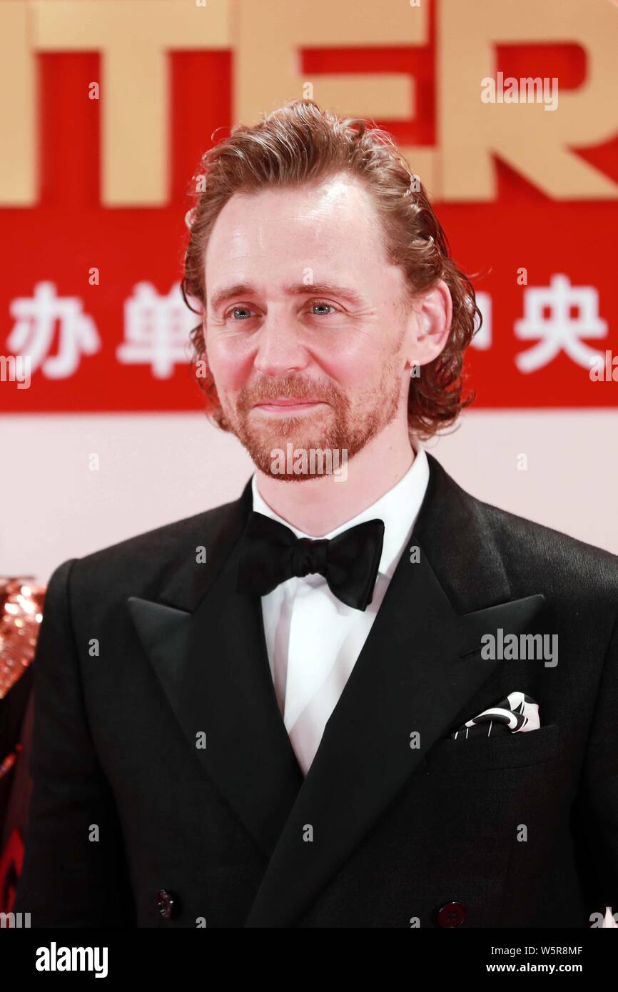 English actor and film producer Tom Hiddleston, center, arrives on the ...