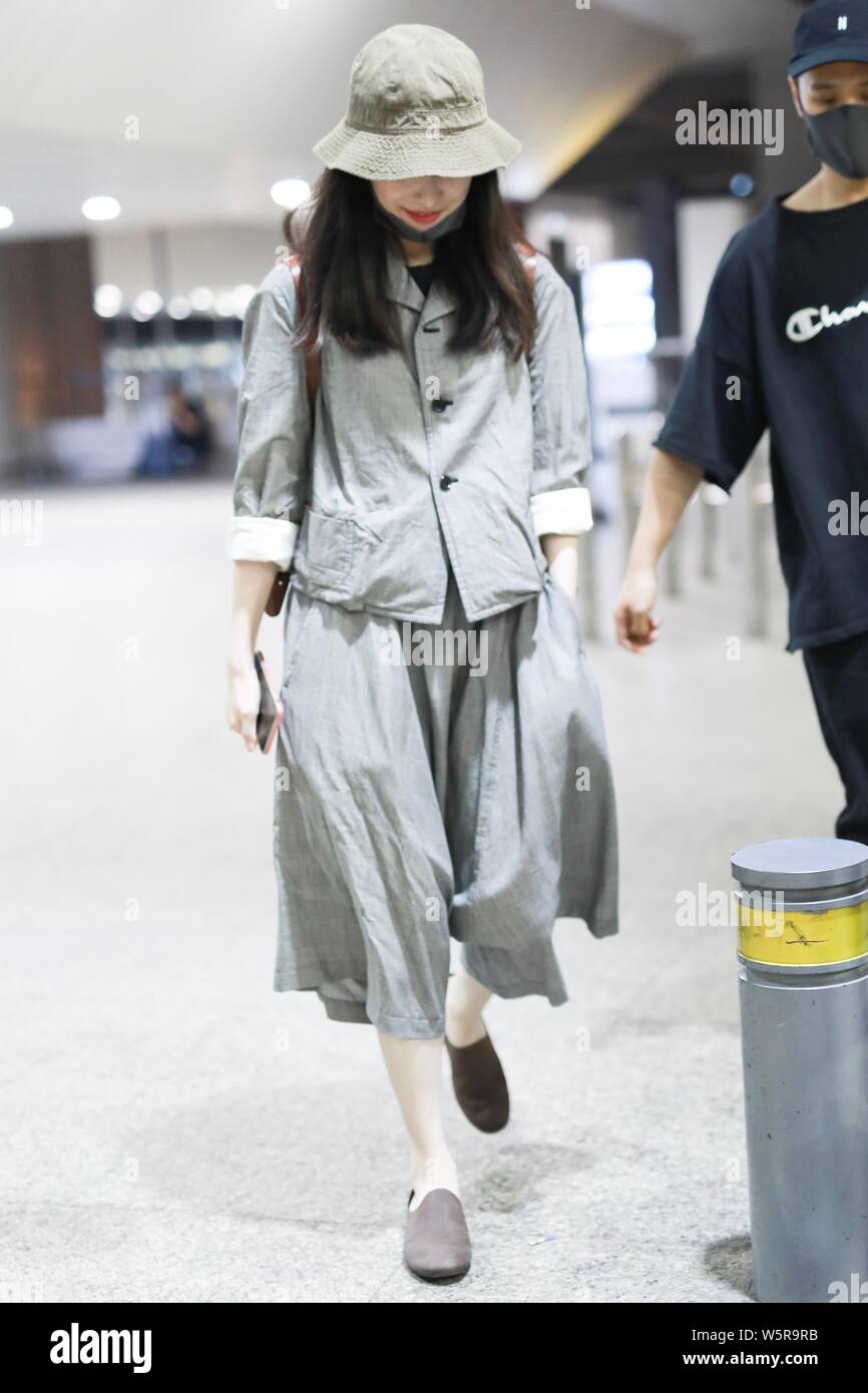 Chinese actress Ni Ni arrives at the Shanghai Hongqiao International