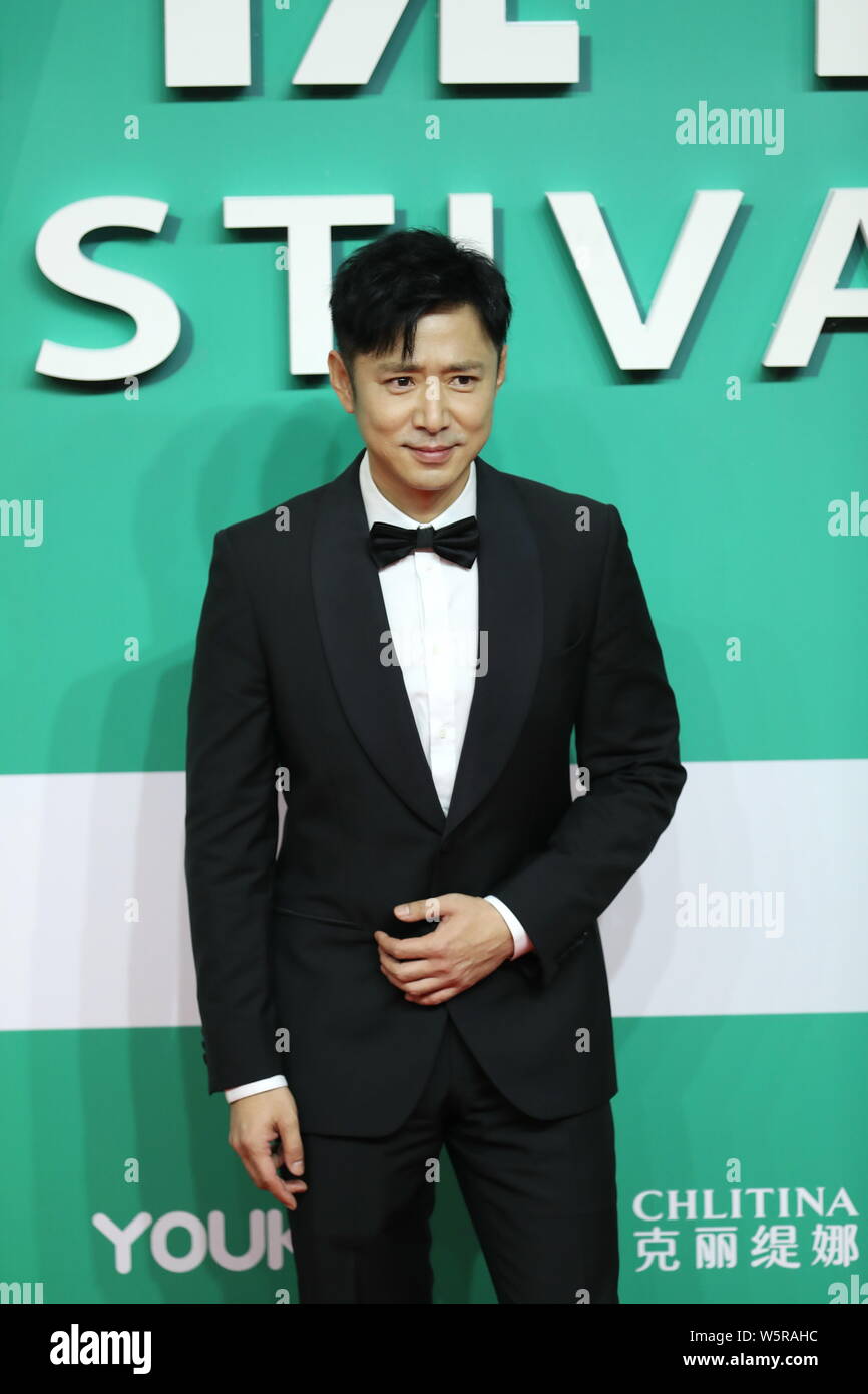 Chinese actor Gao Xin arrives on the red carpet for the 25th Shanghai