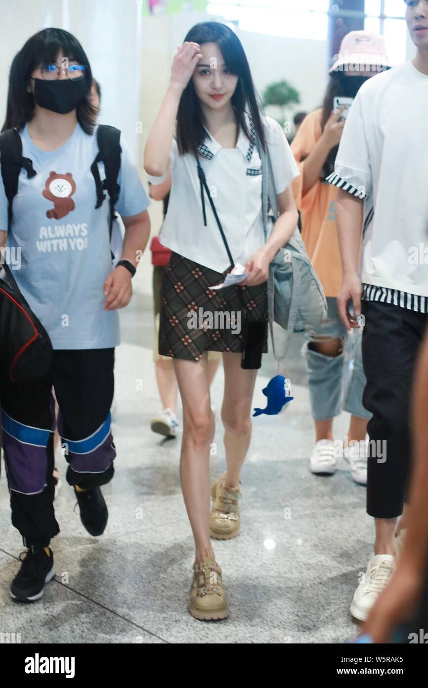 Chinese actress Zheng Shuang arrives at the Beijing Capital International Airport in Beijing, China, 20 June 2019. Skirt: Unif Shoes: Eytys Stock Photo