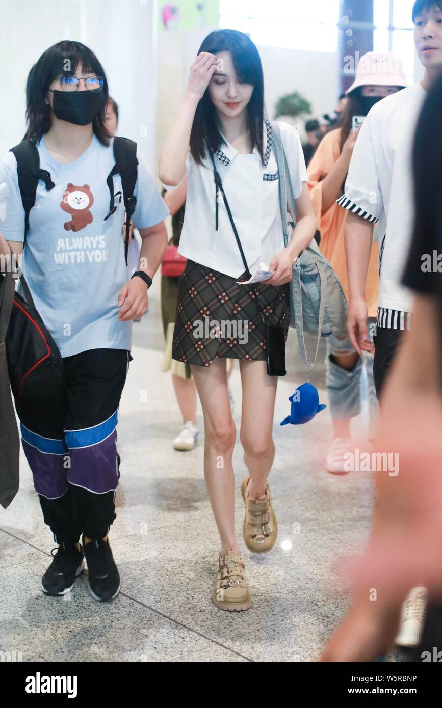 Chinese actress Zheng Shuang arrives at the Beijing Capital International Airport in Beijing, China, 20 June 2019. Skirt: Unif Shoes: Eytys Stock Photo