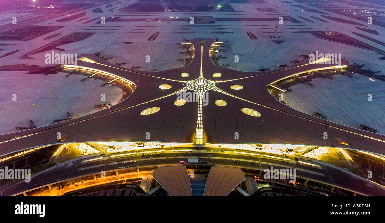 The Beijing Daxing International Airport is illuminated by light ...
