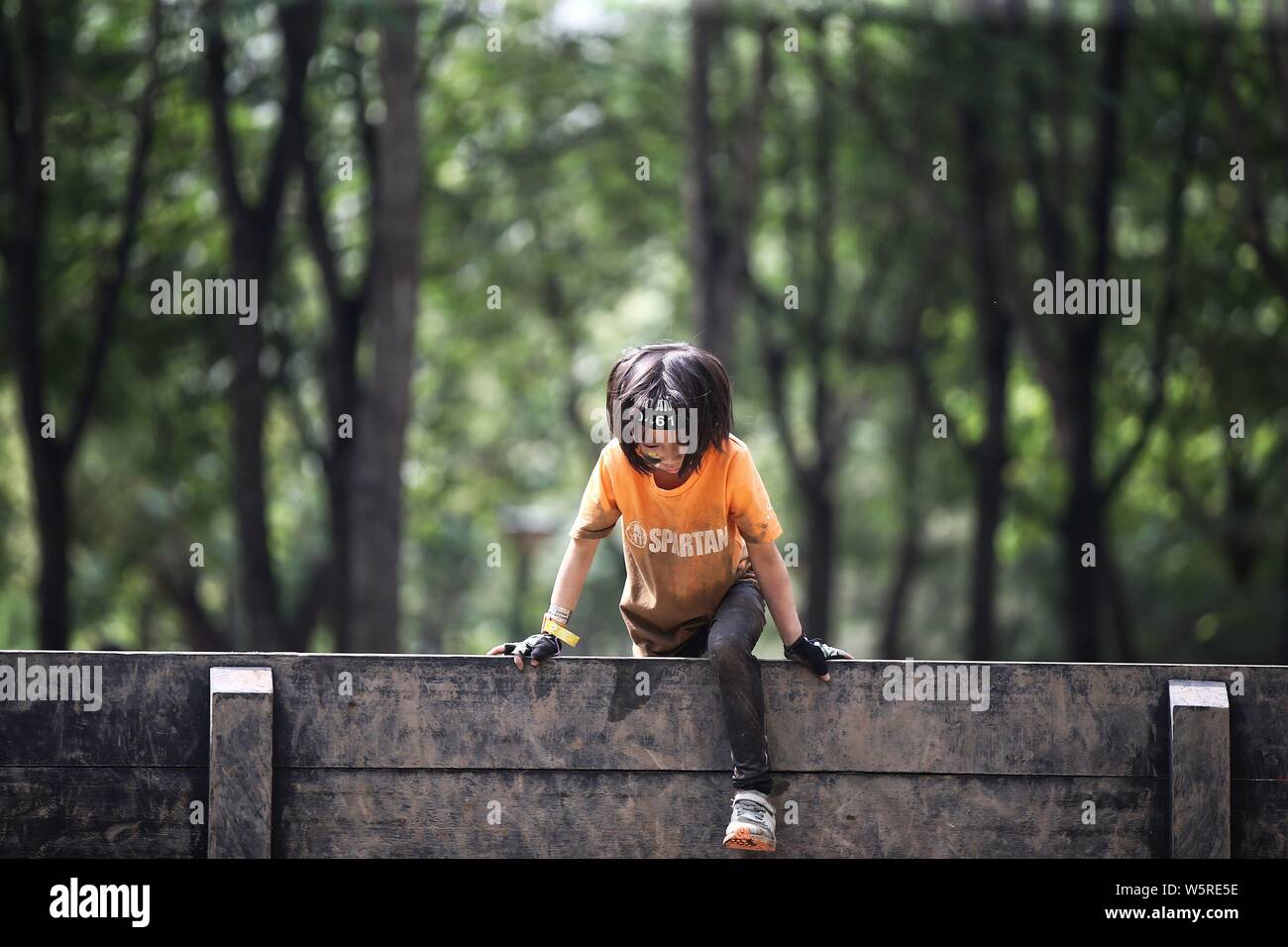 Kids compete in the Spartan kids' race to mark the International Children's Day in Beijing, China, 1 June 2019.   More than ten thousand children part Stock Photo