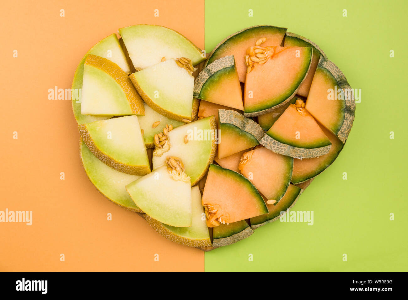 Cantaloupe and Honeydew Melon Slices in Heart Shape, Diet Concept Stock