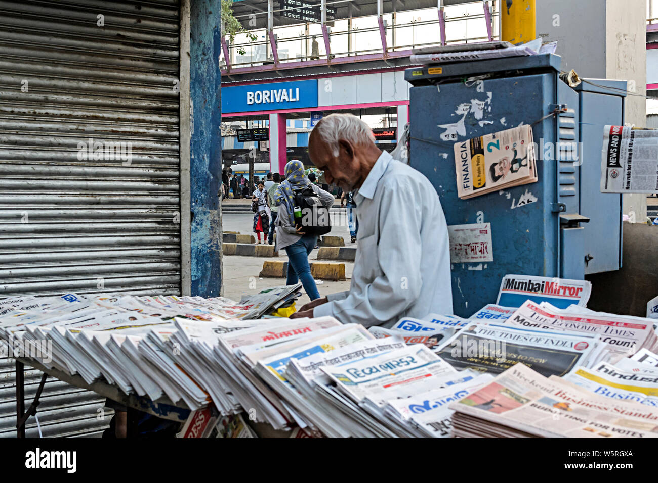 newspaper vendor at Borivali Railway Station Mumbai Maharashtra India Asia Stock Photo