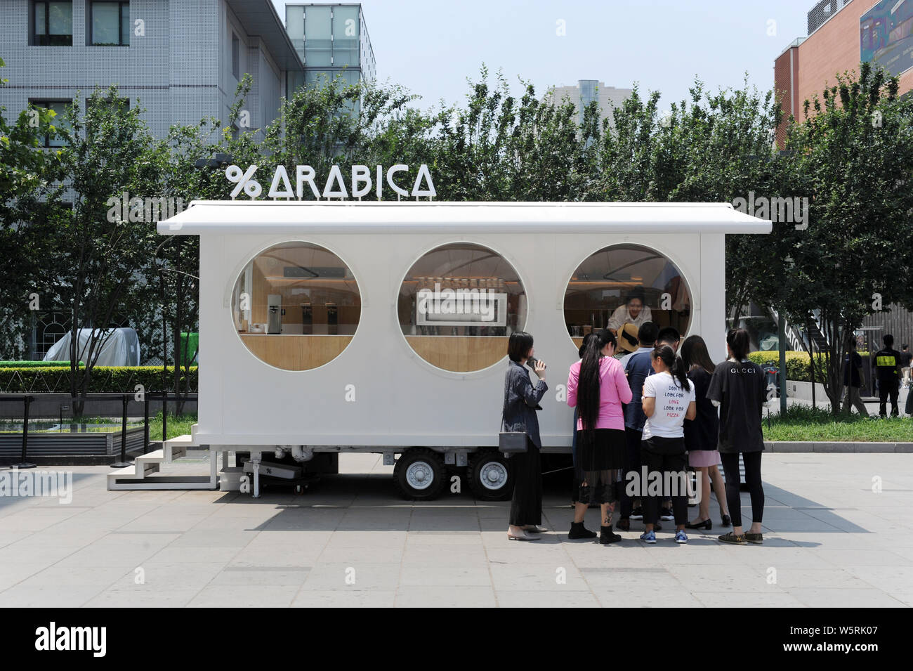 Customers shop at a pop-up store of Japanese java brand %Arabica in Taikoo  Li North, Beijing, China, 11 June 2019. Coffee addicts were awarded a pleas  Stock Photo - Alamy