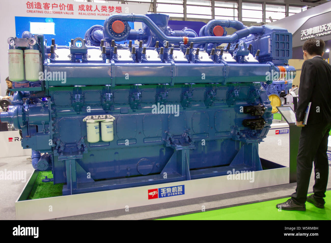 File People Visit The Stand Of Guangxi Yuchai Machinery Company Limited Yc Diesel During An Expo In Shanghai China 22 April 2019 Rolls Royce Stock Photo Alamy