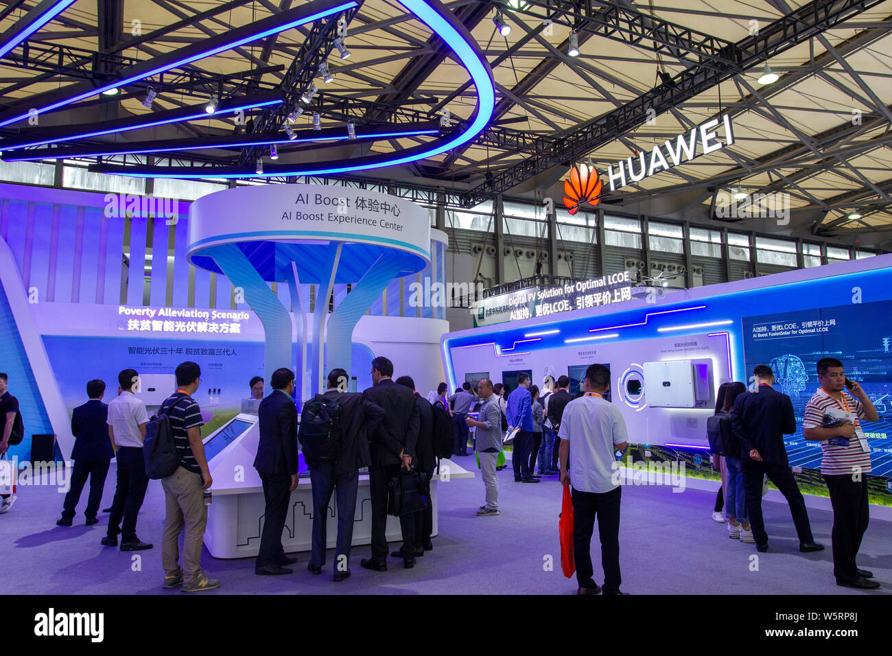 FILEPeople visit the stand of Huawei during the 13th International