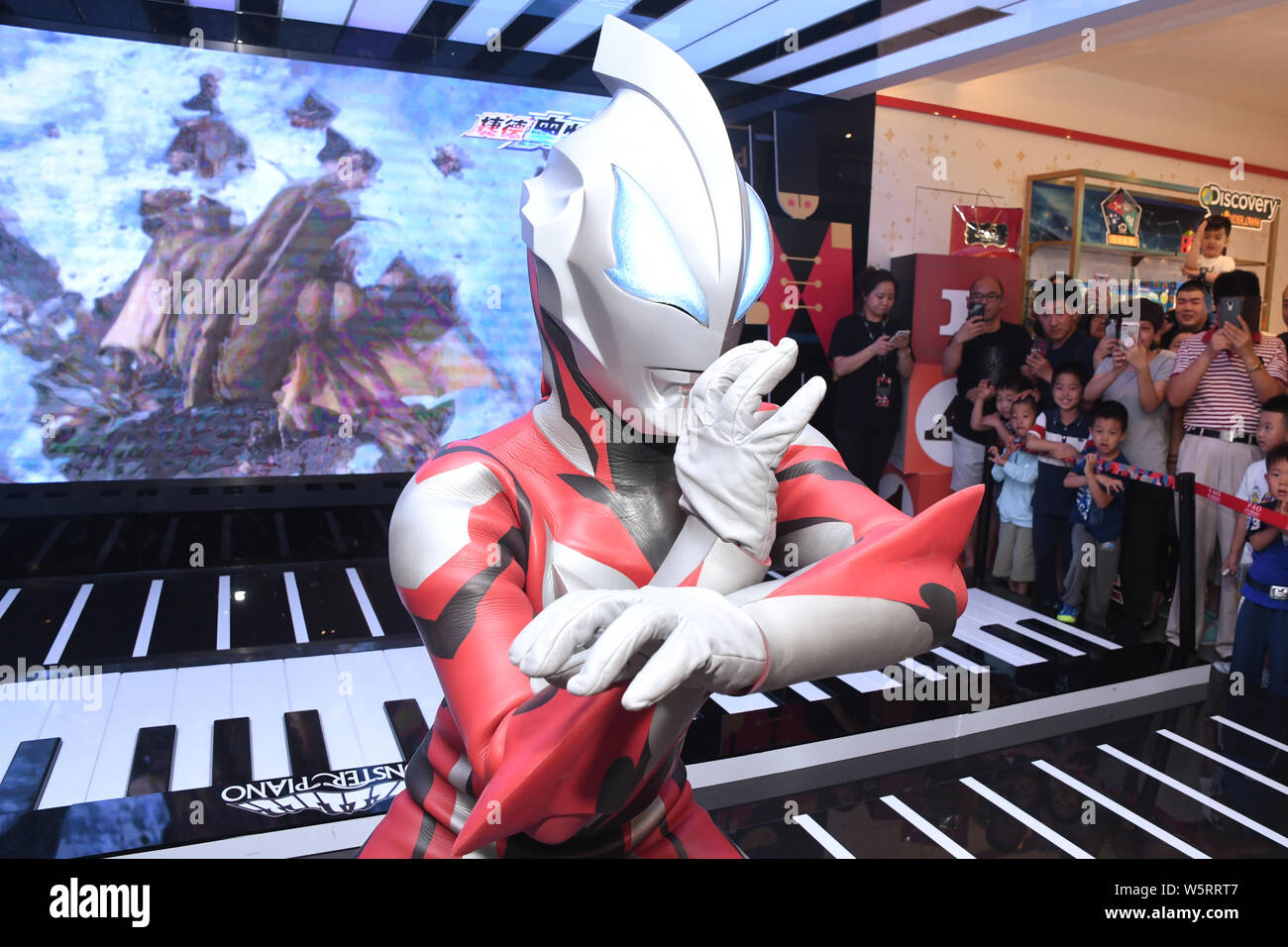 A Chinese Worker Dresses Up As Ultraman Geed From Japanese Tokusatsu Television Series To Celebrate The International Children S Day At A Shopping Mal Stock Photo Alamy