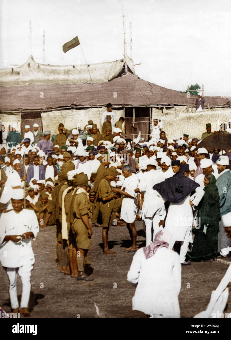 Mahatma Gandhi decorating Congress volunteers for their services Karnataka India Asia December 1924 Stock Photo