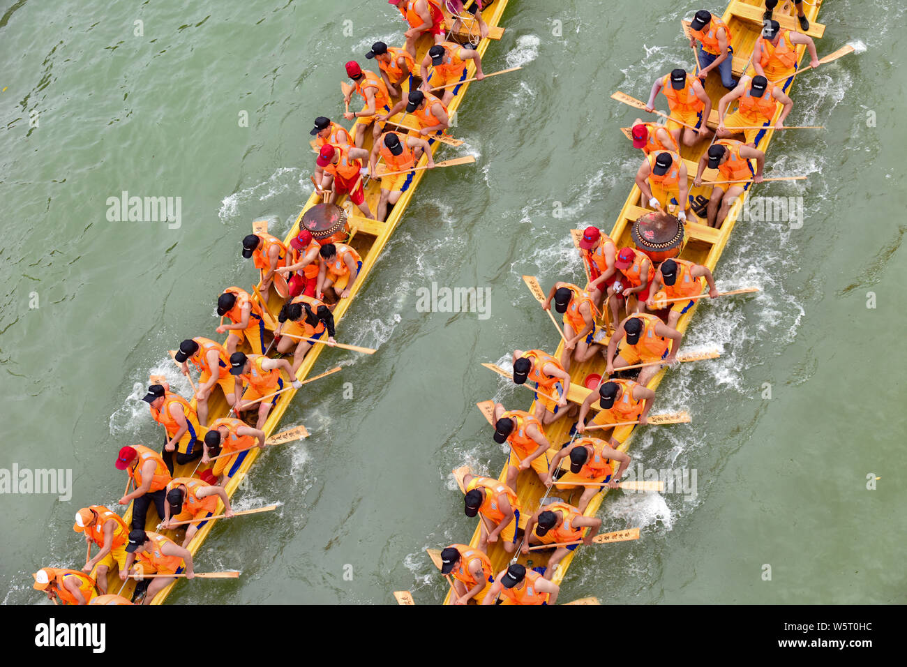 Competitors Take Part In A Dragon Boat Race To Celebrate The Chinese ...