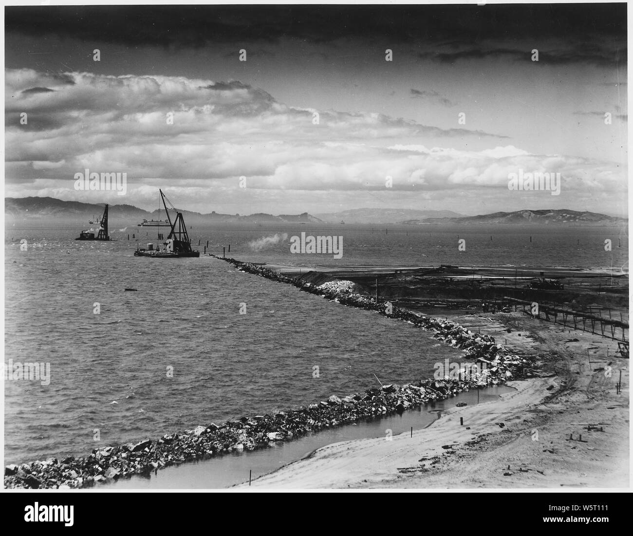 No. 113 Yerba Buena Shoals Rock Wall July 9, 1936 Time 12 Noon; Scope and content:  View from Yerba Buena Island looking North across San Francisco Bay. Stock Photo