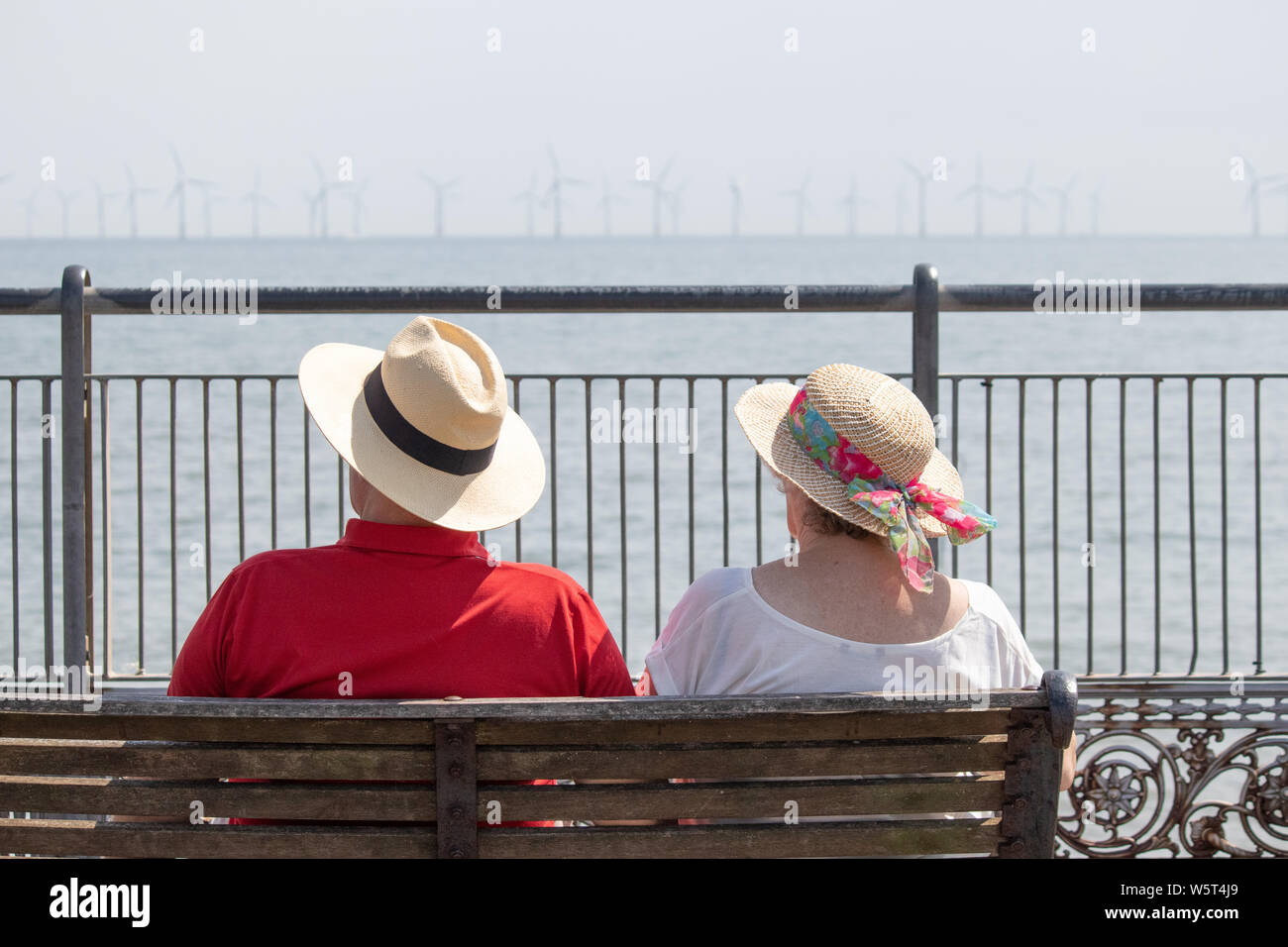 Hot weather in Skegness. People on the end of the pier. Stock Photo
