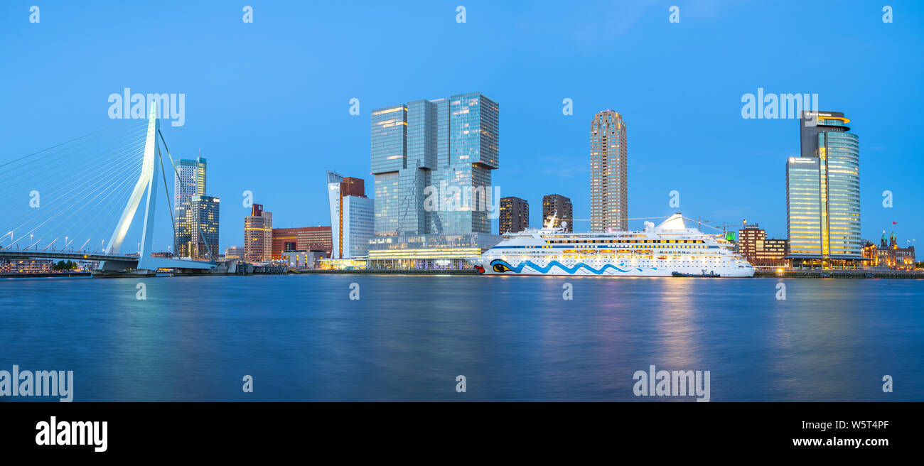 Panorama view of Rotterdam city skyline with Erasmus Bridge in Rotterdam, Netherlands. Stock Photo