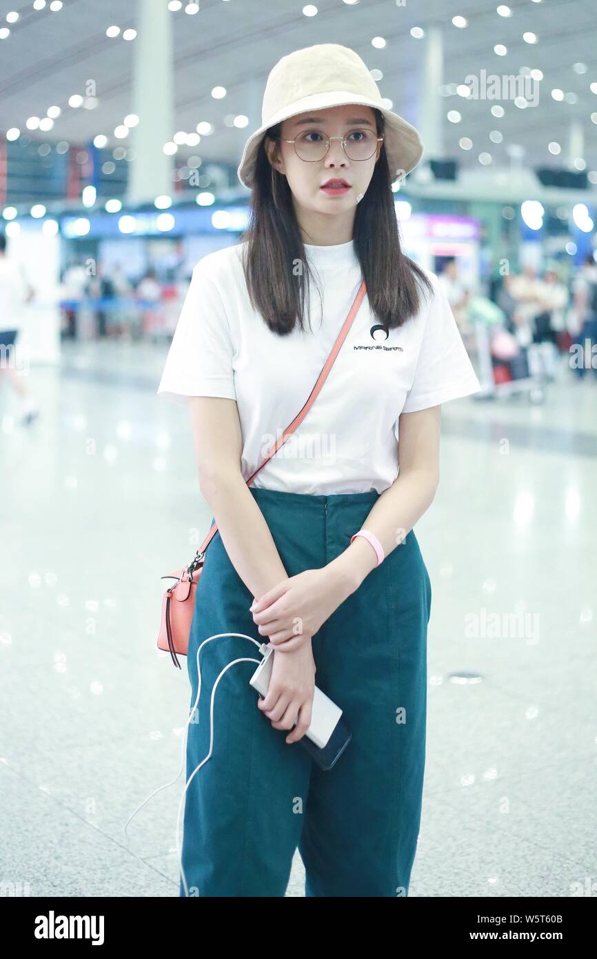 Spotted Shen Mengchen at the airport on May 11 carrying an