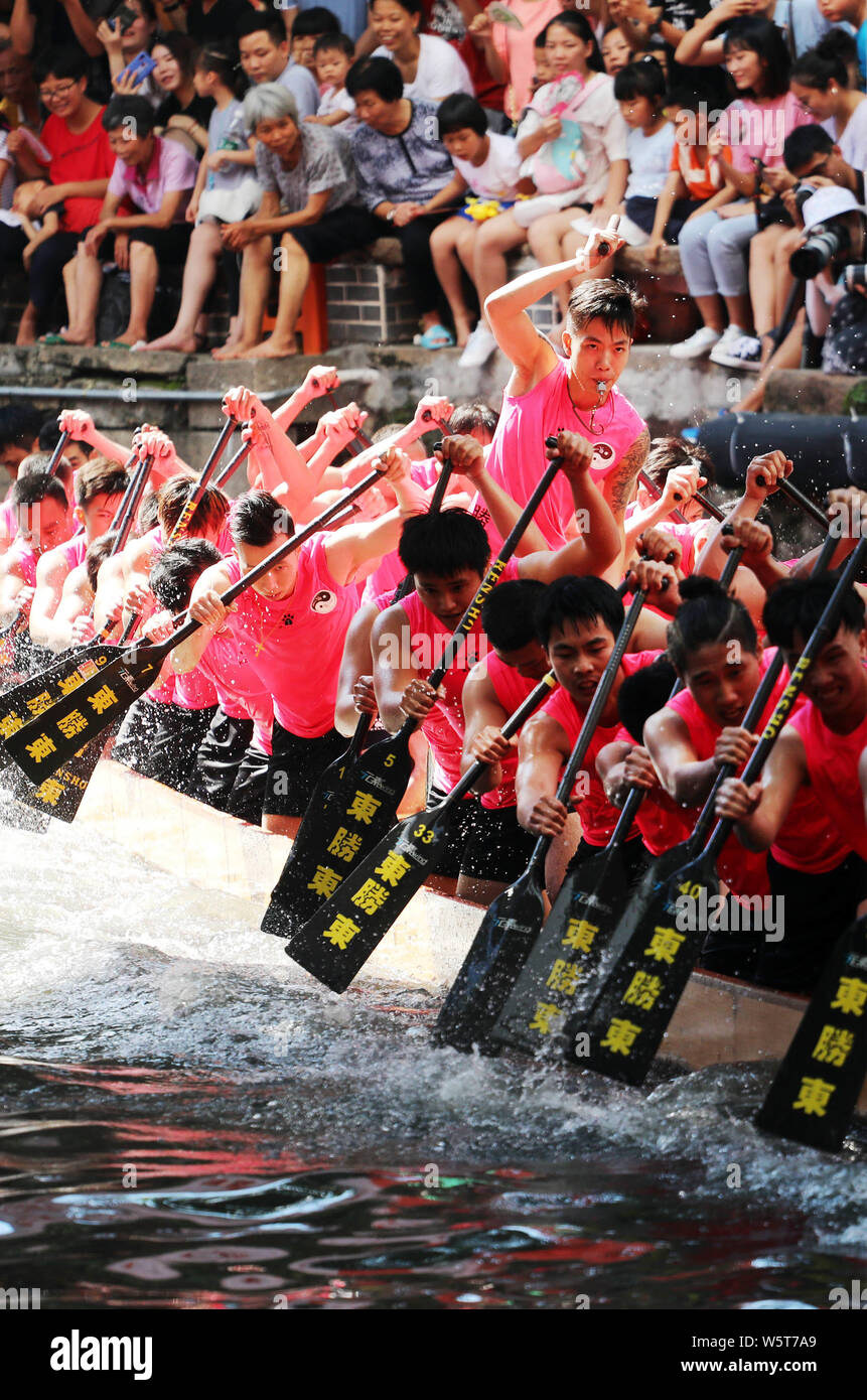 Chinese competitors take part in the Diejiao dragonboat drifting to celebrate the Chinese Dragon Boat Festival or Duanwu Festival in Foshan city, sout Stock Photo