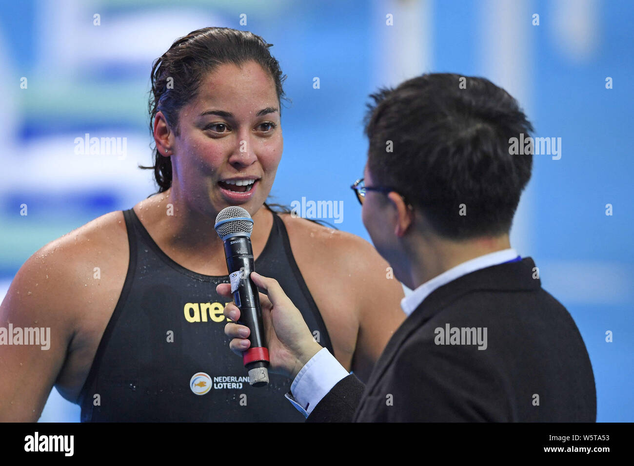 Ranomi Kromowidjojo of Netherlands receives an interview after winning