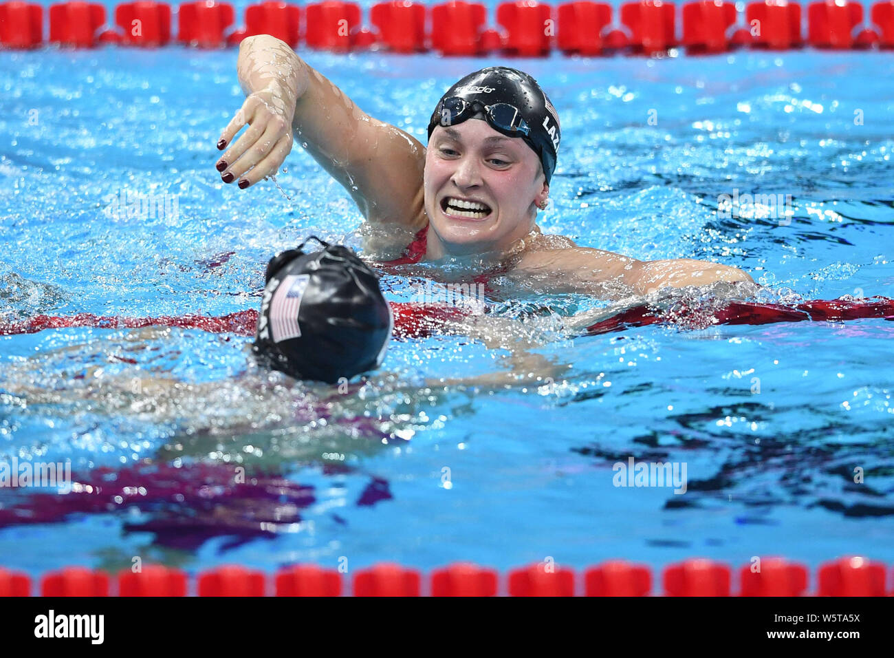 Annie Lazor of the USA, right, celebrates after winning the Women's 200m Breaststroke Final at the 14th FINA World Swimming Championships (25m) in Han Stock Photo