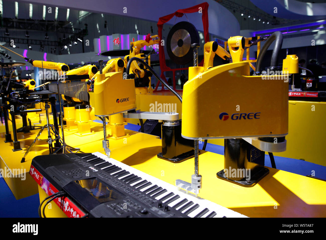 Robot arms of Gree Electric play the musical instruments during the