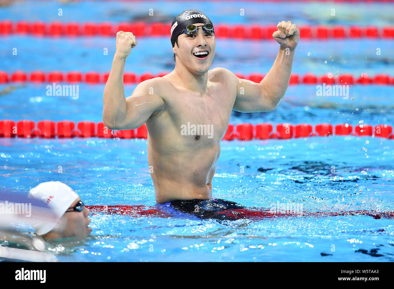 Seto Daiya of Japan celebrates after winning the Men's 200m Butterfly Final at the 14th FINA World Swimming Championships (25m) in Hangzhou city, east Stock Photo