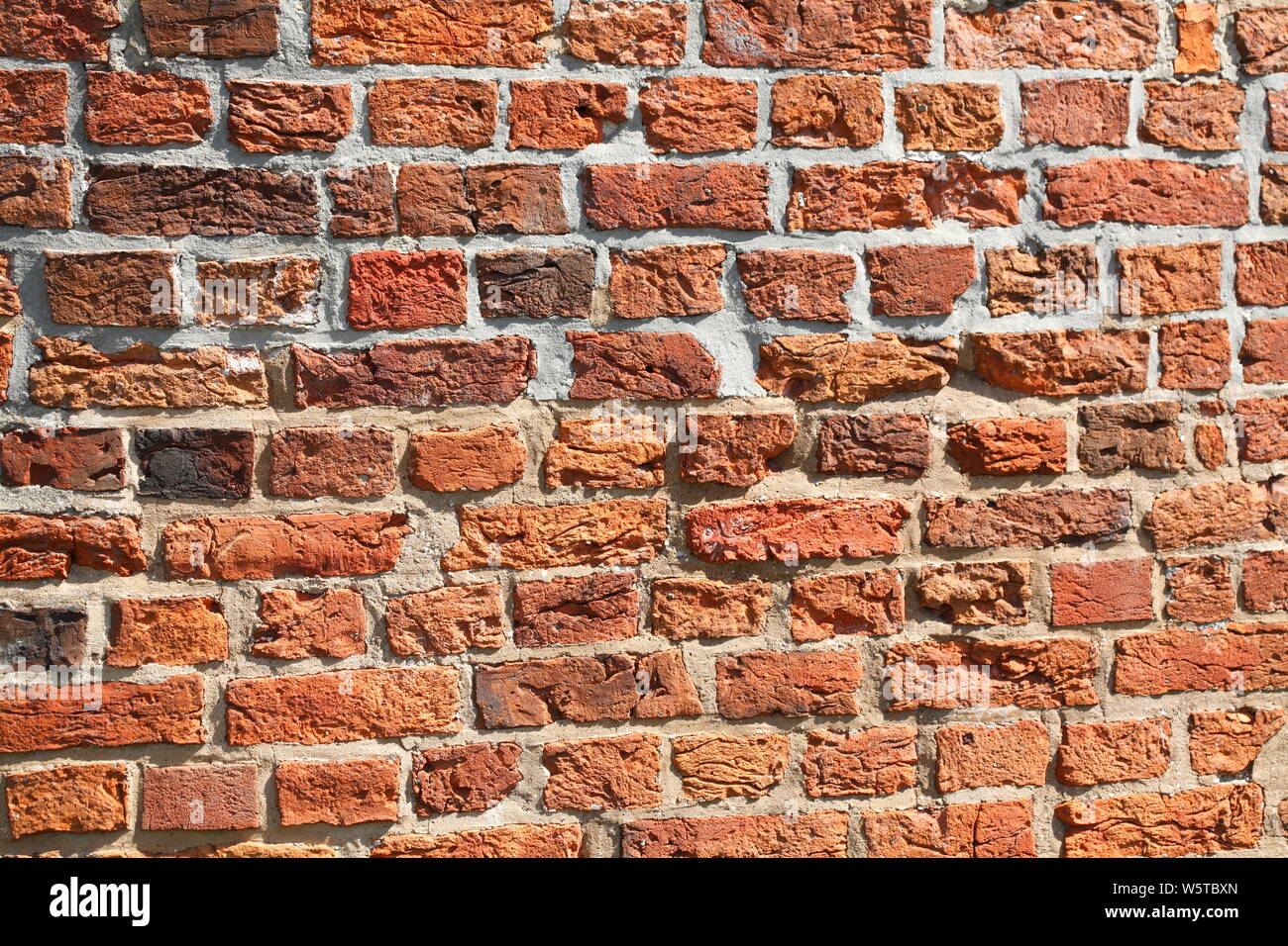 reddish brick wall, bricks, Backgound image Stock Photo