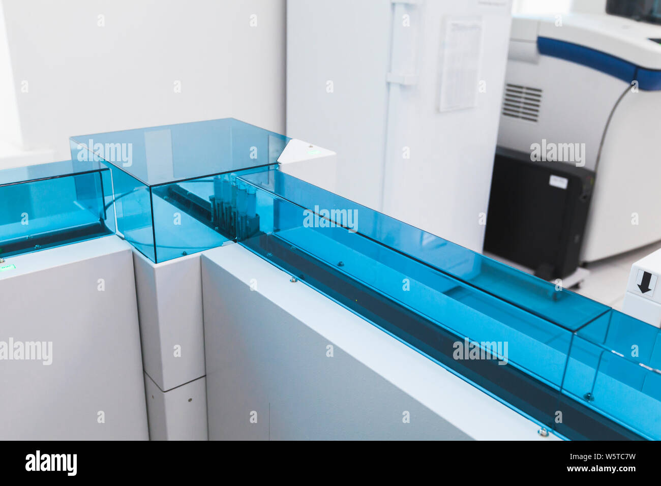 Blood samples are on the tray of bio bank pre-analytical system. Clinical laboratory and blood bank, fully automated equipment Stock Photo